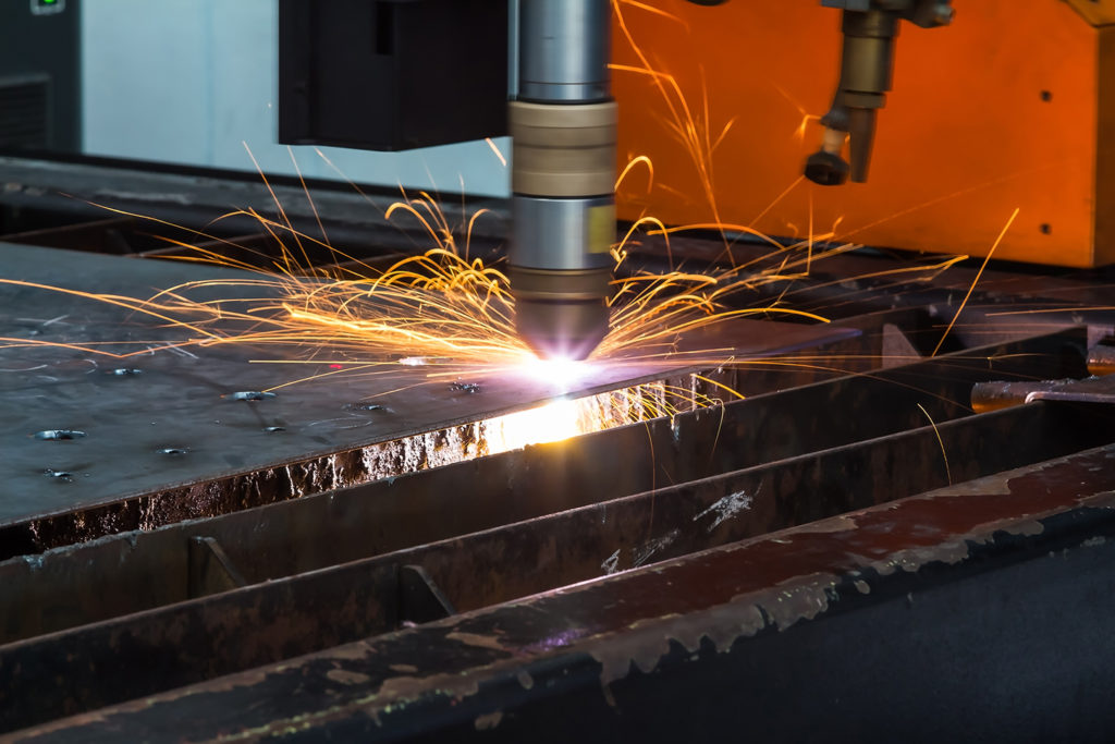 A CNC machine cutting steel